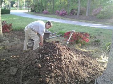 Owner and horticulturalist Blade Waldrop working on a Brightwater landscape project.
